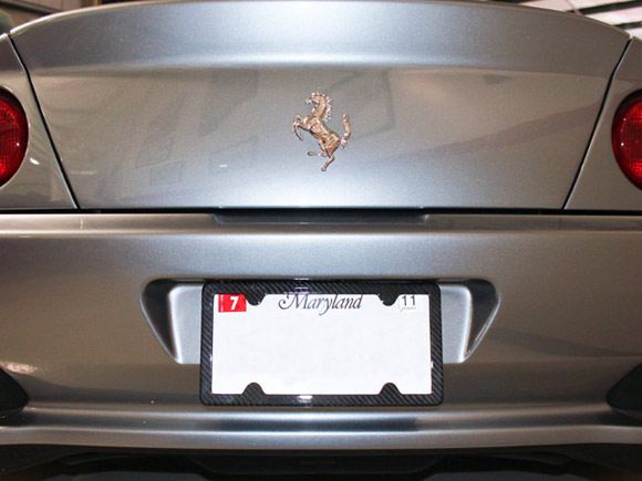 Carbon fiber license plate frame on a Ferrari