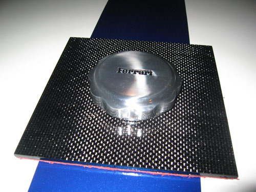 Carbon fiber Ferrari gas cap paperweight