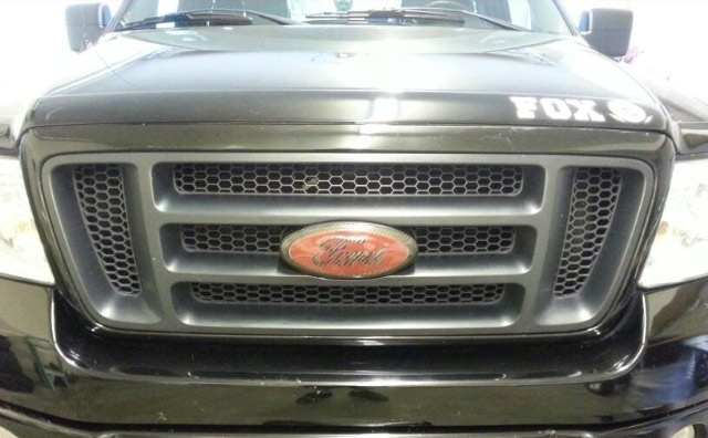 Carbon fiber Ford emblem on truck