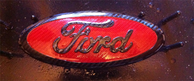 Clearcoating carbon fiber Ford emblem