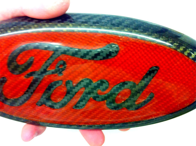 Close up of carbon fiber Ford emblem