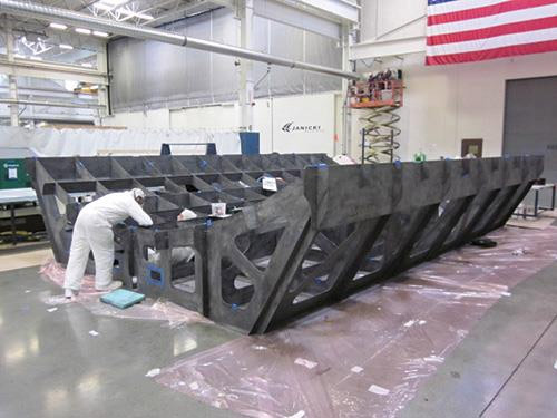 Assembly of the VARTM carbon fiber/epoxy substructure components.