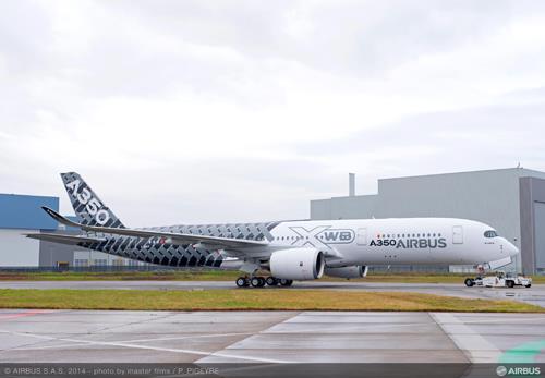 Airbus rolls out third A350 XWB test plane with carbon fiber livery