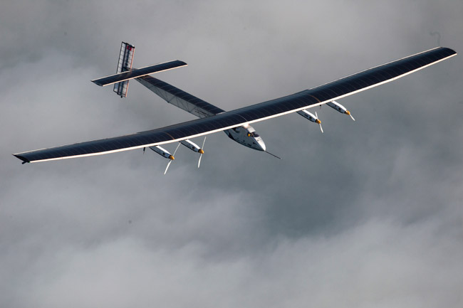 Solar Impulse 2 flying over Switzerland during test flights in 2014