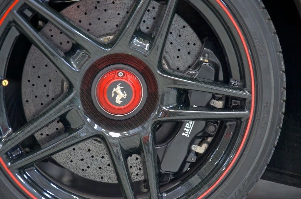 Exposed carbon fiber Enzo Ferrari wheel